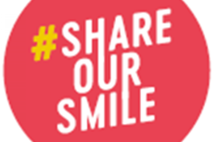 logo share our smile